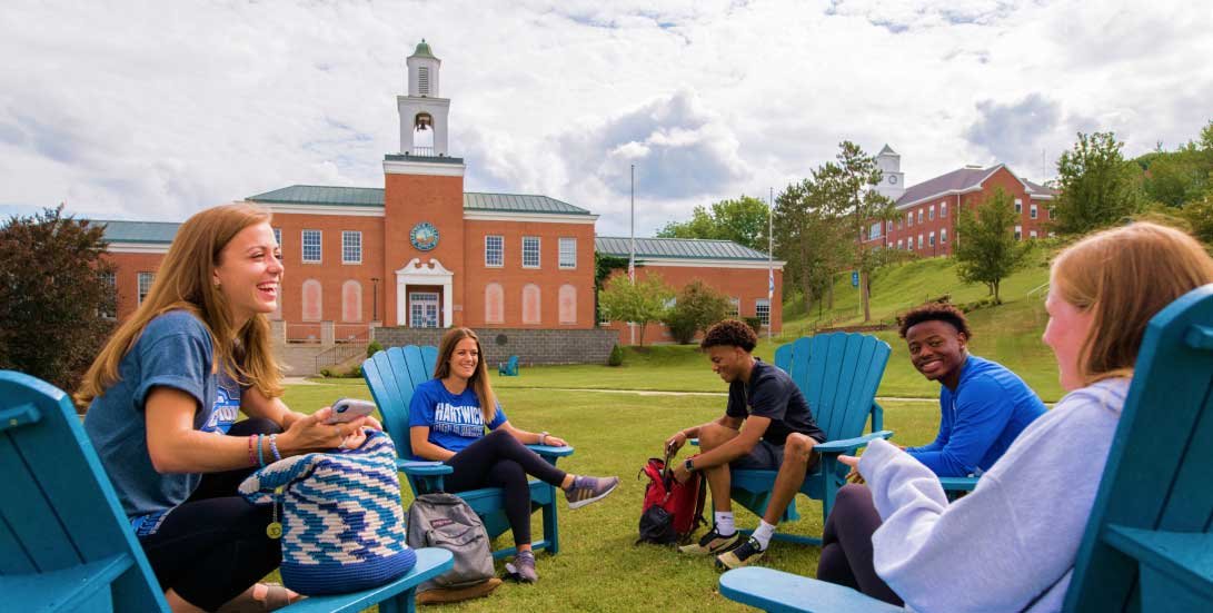 students relax outdoors