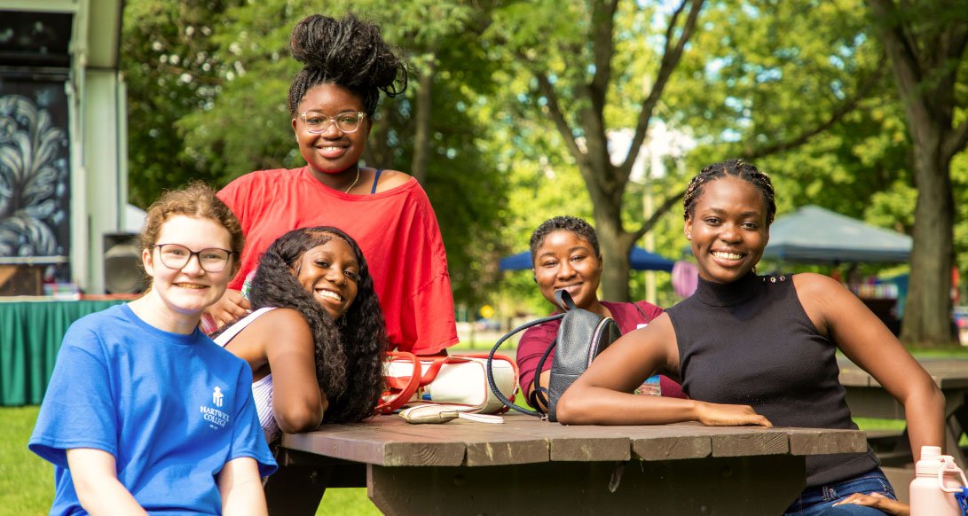 black female students at outdoor table