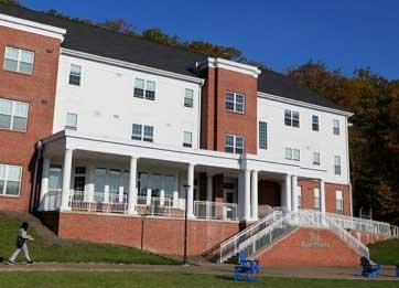 large brick building with porch area